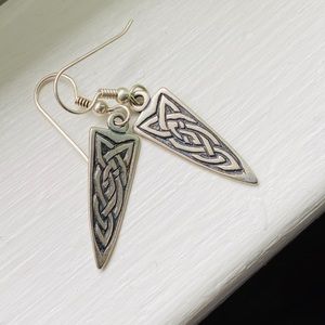Celtic knot design silver earrings.